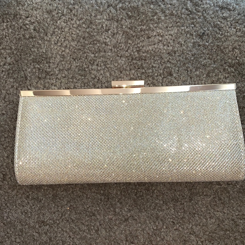 Charming Charlie gold clutch hand bag